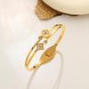 Raffinato Bracciale Quadrifoglio Guscio Bianco Acciaio di Titanio - Gioiello Elegante e Lussuoso da Donna