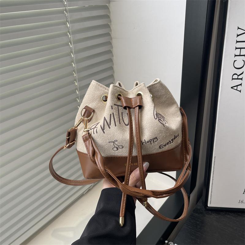 

Women s bag 2 new versatile twist portable bucket bag commuter fashion retro messenger bag