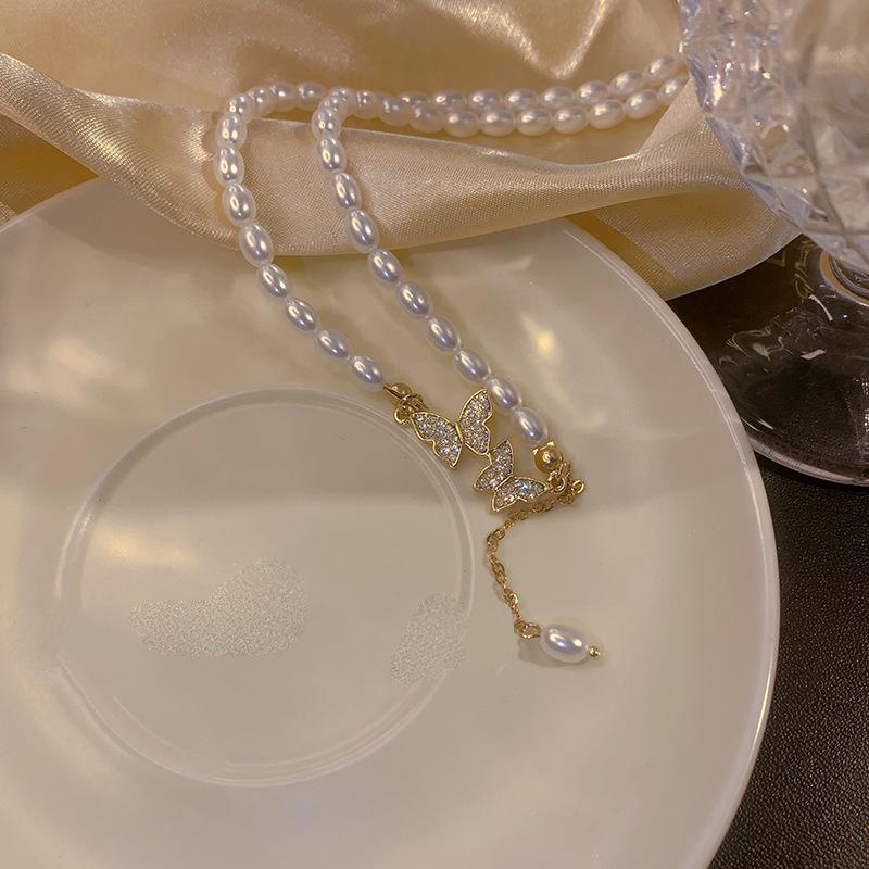 Vintage light luxury butterfly pearl necklace female pendant feeling collarbone neck chain choker