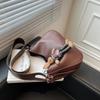 Retro einfarbige Damen-Reisetasche Messenger Bag Plutoniumleder Umhängetasche vielseitige Bucket Bag für Damen
