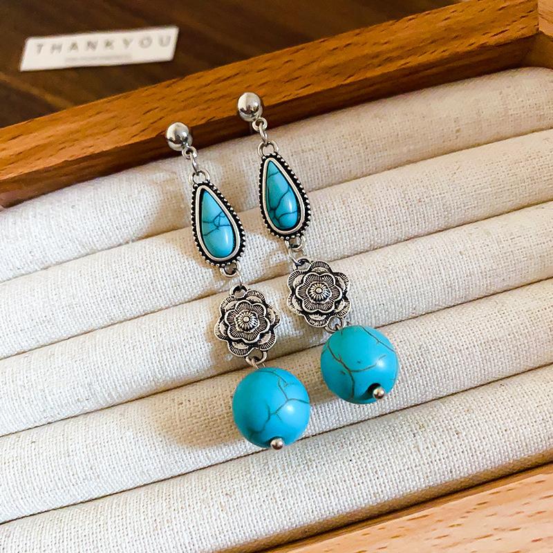 Europäischer und amerikanischer ethnischer Stil, mit Diamanten besetzte Wassertropfen-Quasten-Ohrringe, Steckerohrringe, Damenohrringe, Design-Sinn Nische