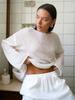 Lightweight Knit Pullover Sweater with Wide Round Neck and Flared Long Sleeves Loose Fit Layered Hem Casual Top for Women
