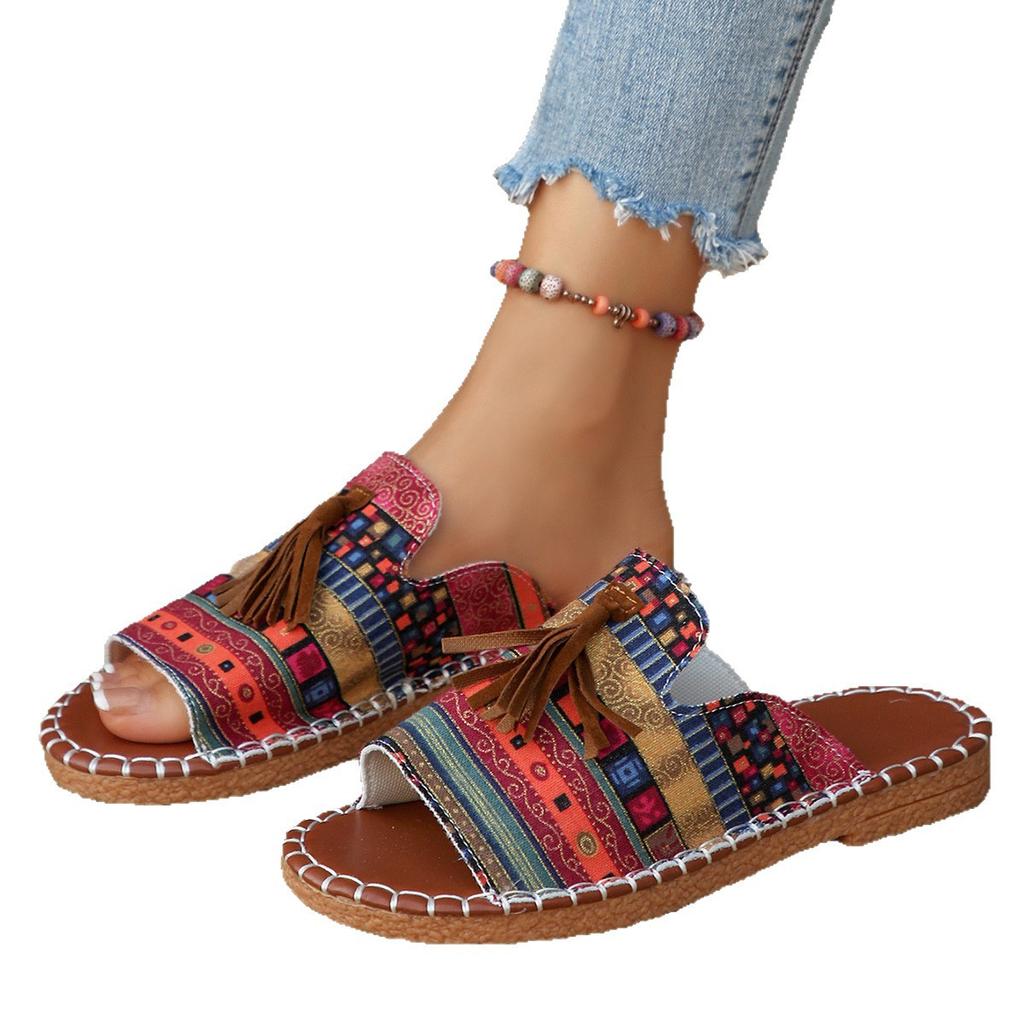 Pantoufles bohèmes à semelle plate pour femmes 2025 été nouveau style célèbre à franges sandales de plage grande taille pantoufles pour femmes