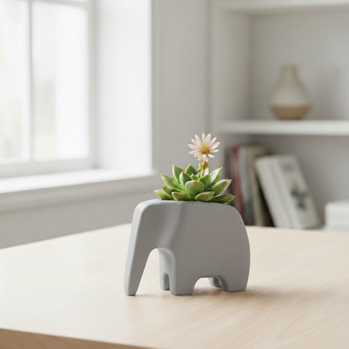 Decorative gray pot in the shape of an elephant for succulents