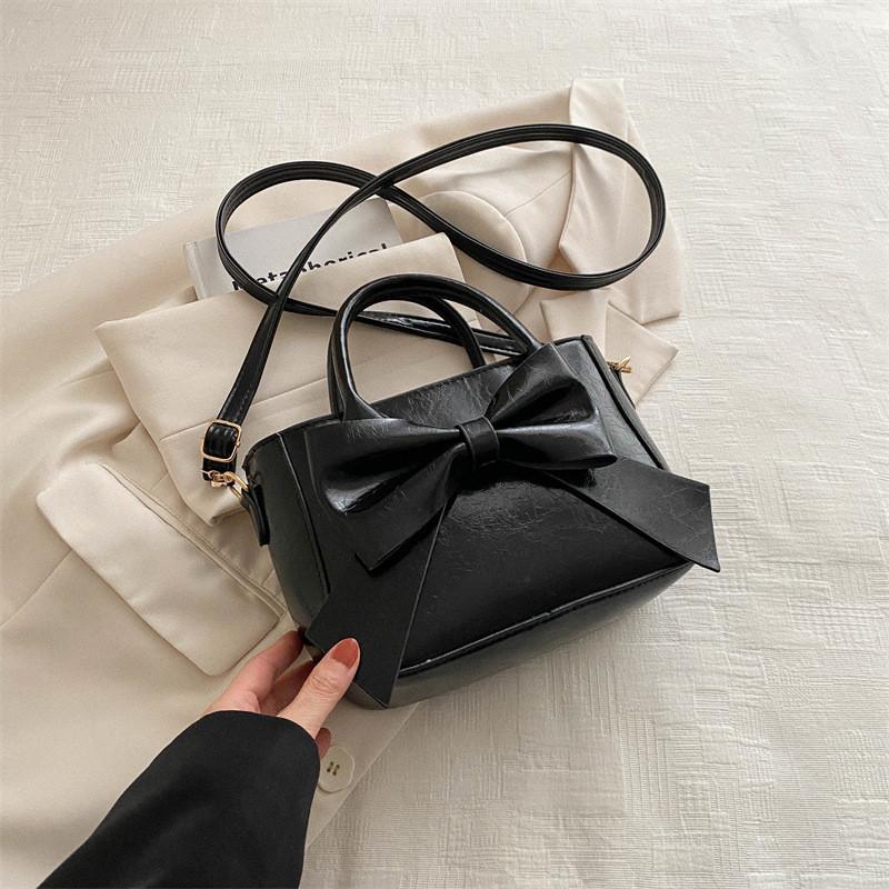 

2024 New Fashion Design Single Shoulder Crossbody Bag With Pure Color Butterfly Knot Simple Texture