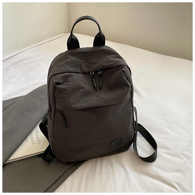 Large capacity bag new simple casual versatile backpack female college student schoolbag lightweight travel backpack
