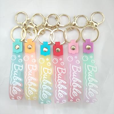 PVC Keychain with Leather Cord and Candy Soft Rubber Doll, Transparent Lanyard, and Jelly Gradient Color Hand Rope