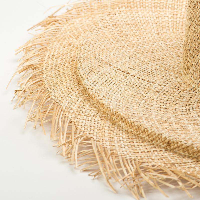Summer new sun hat European and American simple treasure grass big burr edge beach hat spring and summer sun protection big eaves flat top straw hat