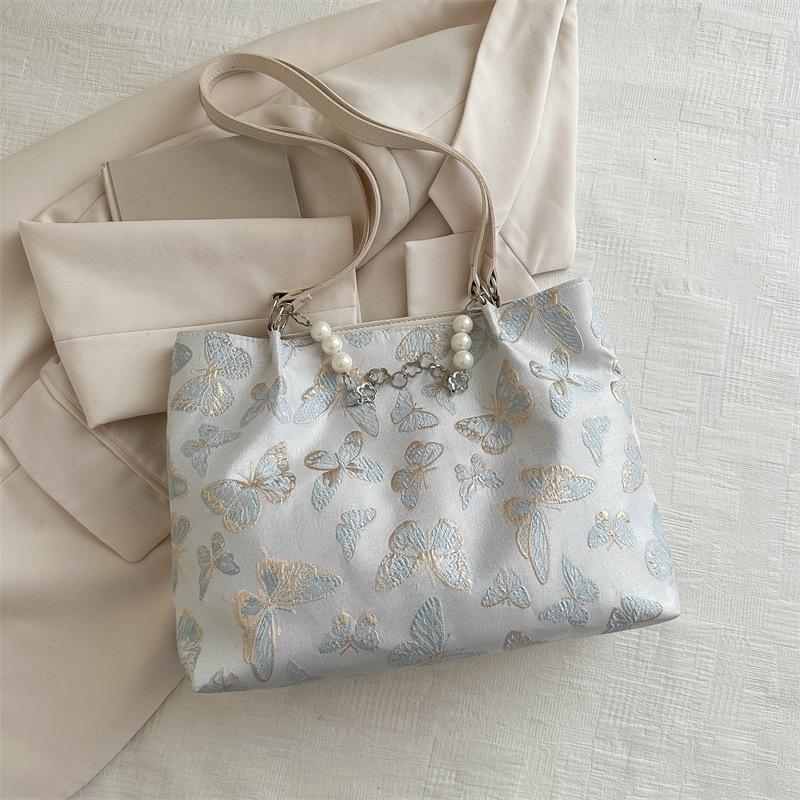 

Большая вместимость, модная корейская версия сумки через плечо с жемчужной цепочкой для женщин на весну и лето, новая высококачественная сумка-тоут для женщин