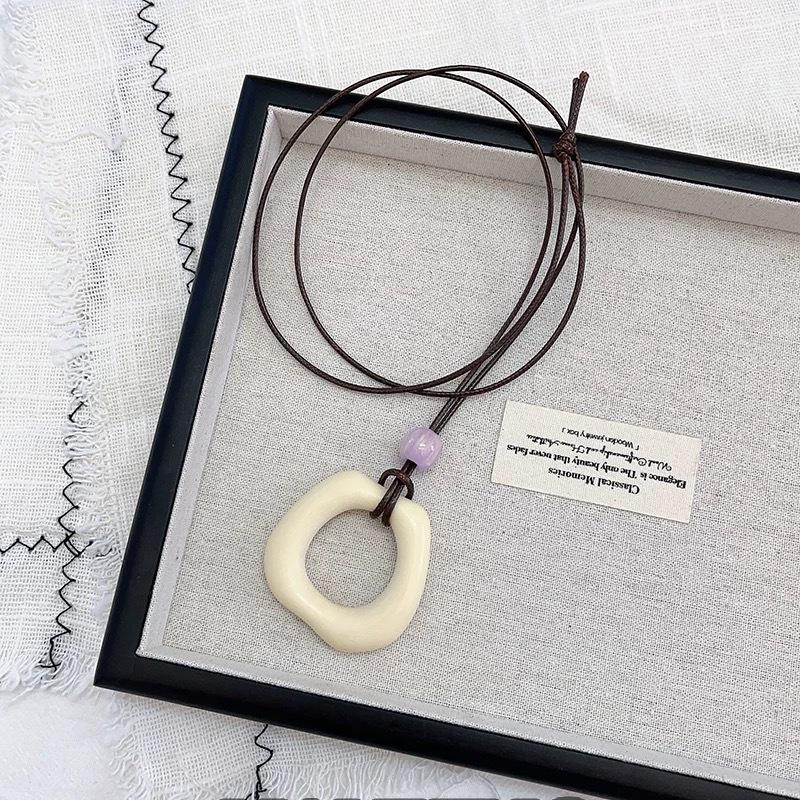 Women's Long Summer Macaron Necklace: Milky White Pendant, Light Luxury, Versatile Sweater Chain