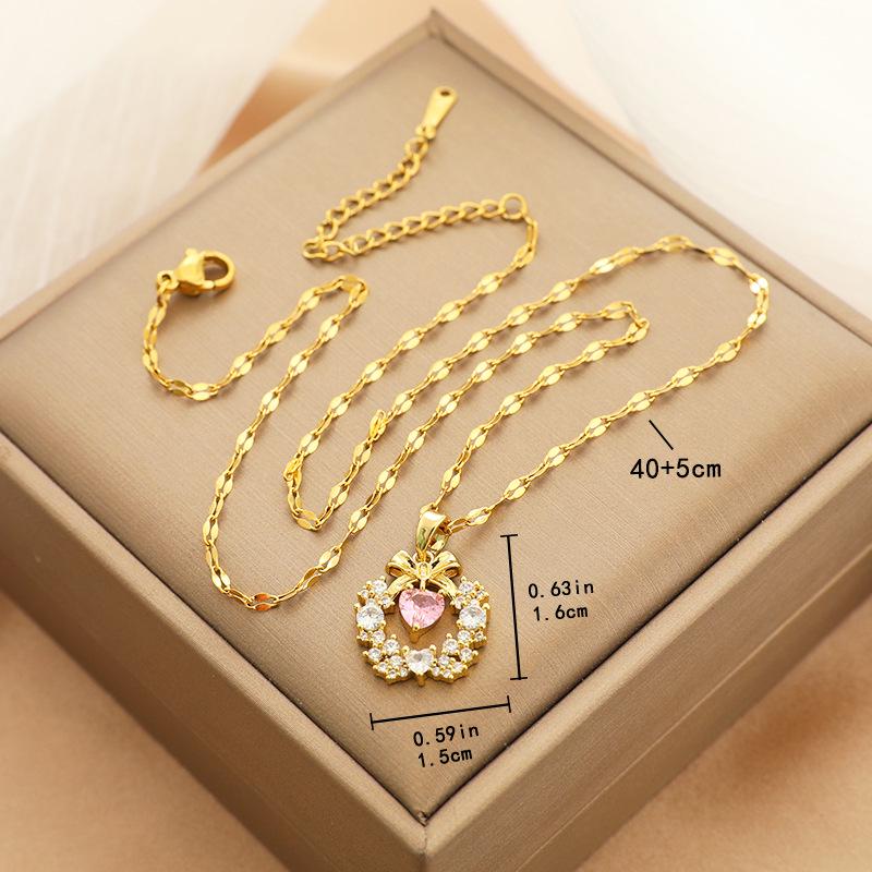 Women's Japanese and Korean Christmas Bow Wreath Necklace with Pink Diamond Heart On Titanium Steel Chain