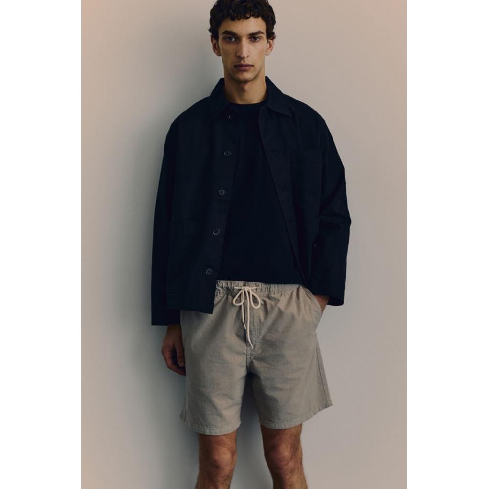 

Хлопковые шорты HM стандартного кроя бежевого цвета