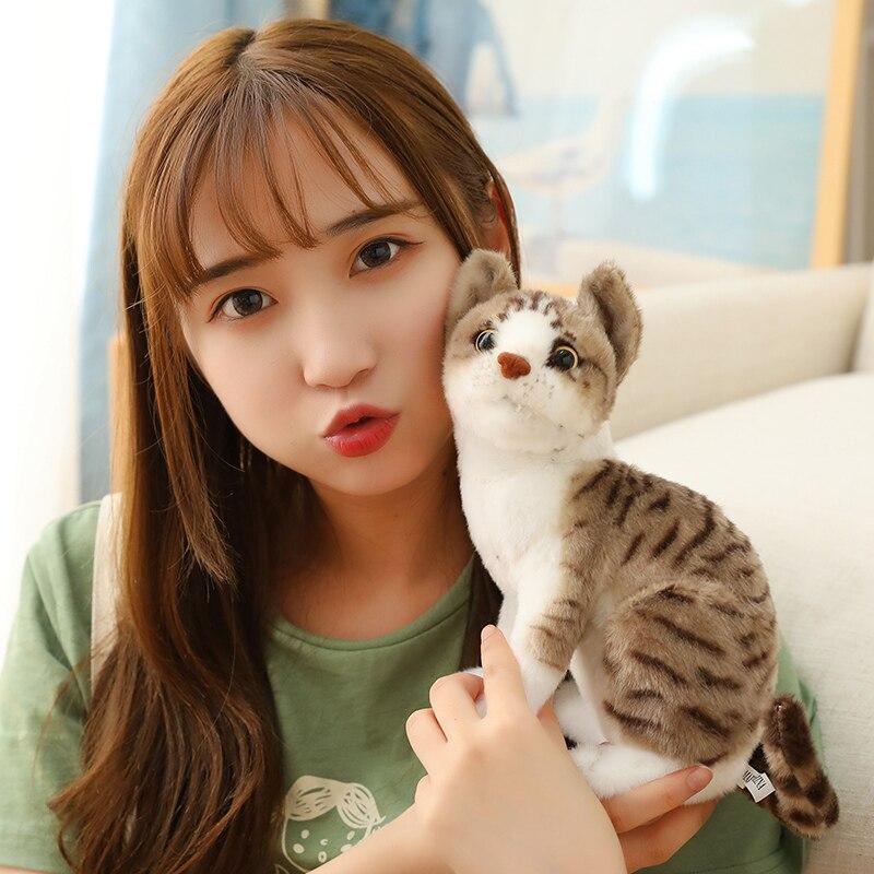 NASSMOSSE Peluche de Gato siamés de 10 Pulgadas, Postura acostada Realista, Animal Peluche Gato siamés, muñeca Transpirable respetuosa con la Piel