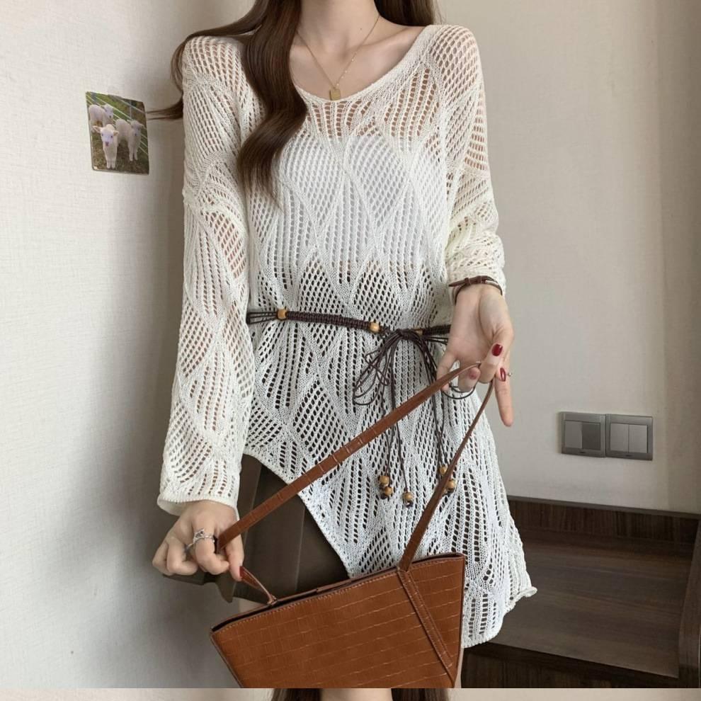 Rhombus lazy V-neck hollow long-sleeved knitted sweater women's spring and summer hem irregular sunscreen blouse knitted top