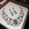 Meier Diamond-studded teardrop oval necklace and earring jewelry set - elegant regal style