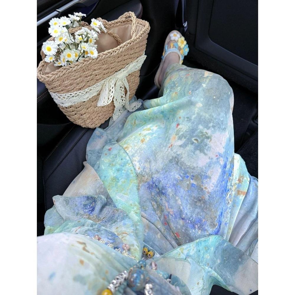 Beach skirt 2025 summer new suspender temperament dress women's summer printing thin dress holiday style