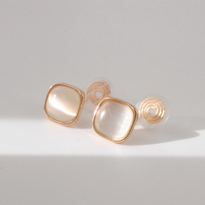 Elegant Chinese Cat's Eye Stone Ear Clips for Women - High-End Mosquito Coil Disc Earrings