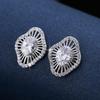 European & American Floral Hollow Design Stud Earrings with Geometric Diamond Inlay