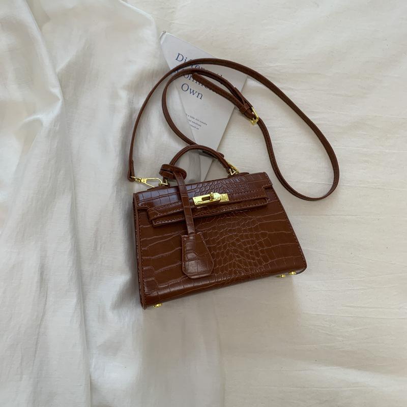 Korean version of fashionable niche stone pattern bag 2025 autumn new texture handbag retro fashion messenger bag bag