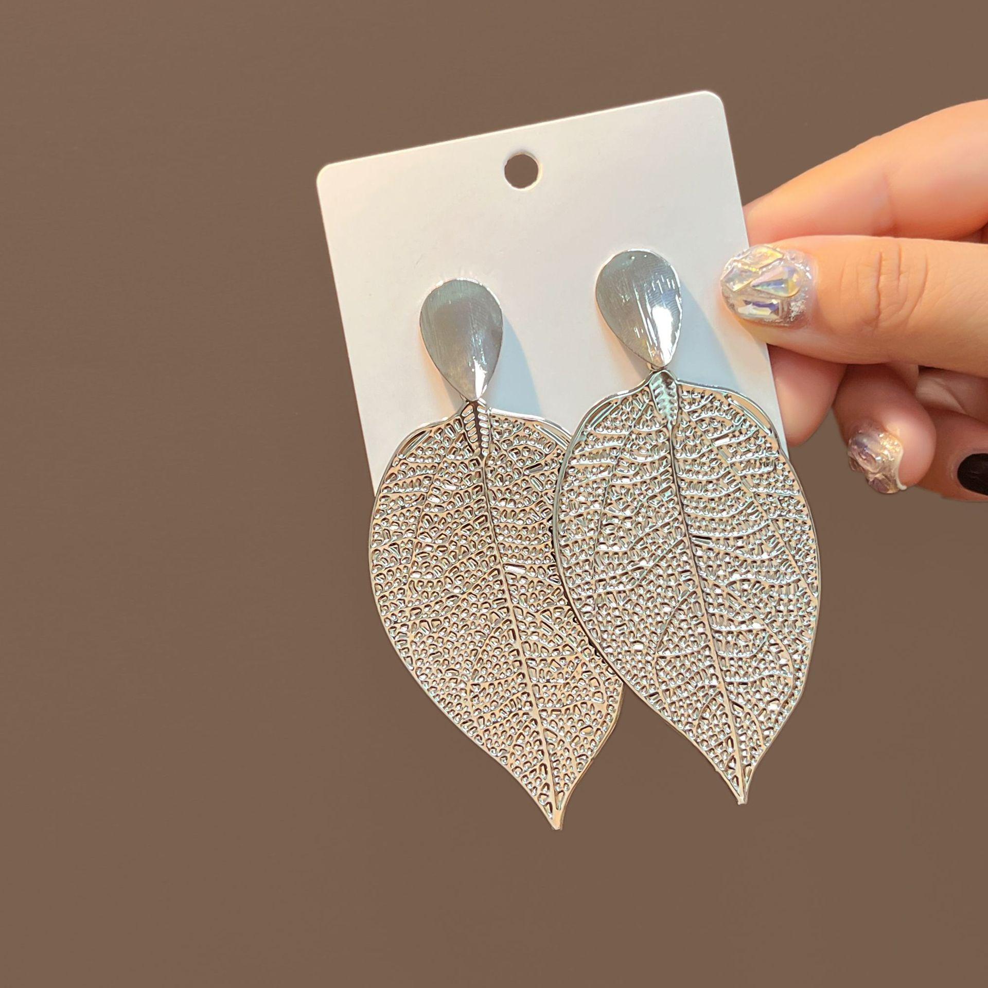 

Leaf Hollow Temperament Earrings Women S Style Exaggerated Irregular Earrings Retro Temperament High Sense