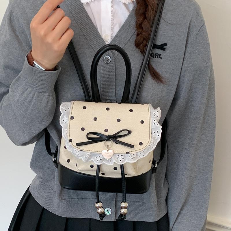 Schoolbag Korean version fashionable girl foreign style portable small bag 1011 summer new lace high value backpack