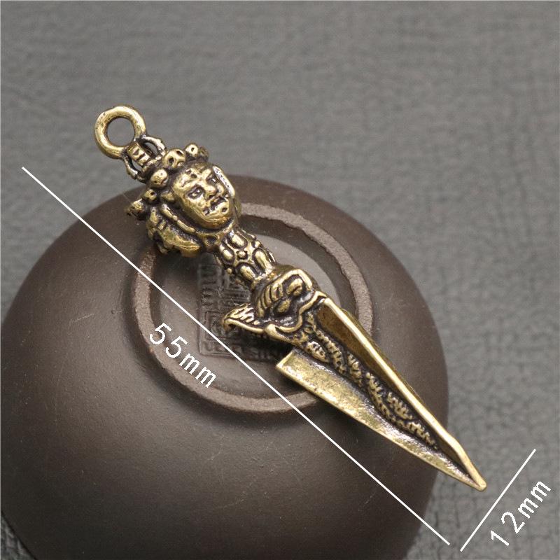 Messing Vajra Stößel Schlüsselanhänger: Goldener tantrischer Anhänger & kleines Ornament