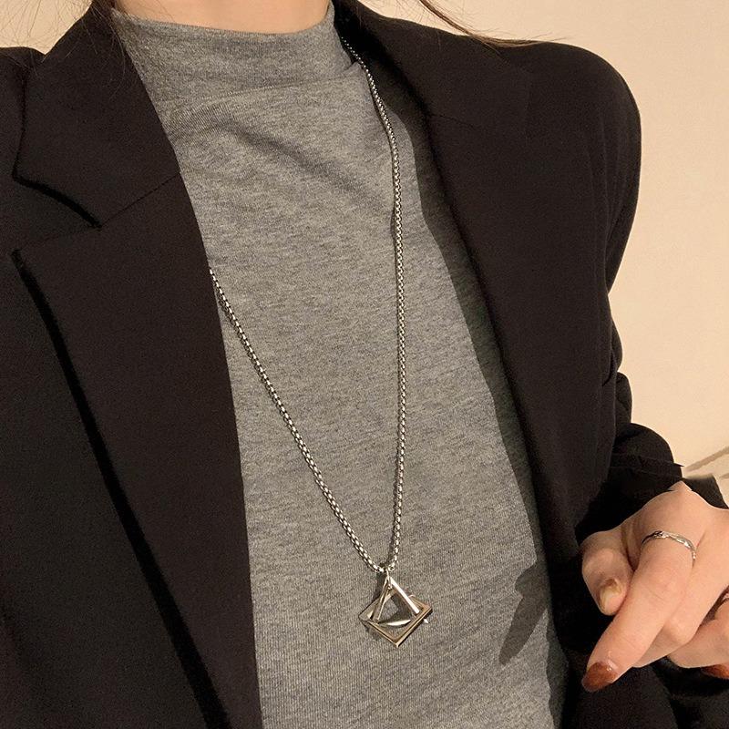 Stainless steel heavy industry triangular pendant necklace exquisite high-end clavicle chain new trend sweater chain jewelry wholesale