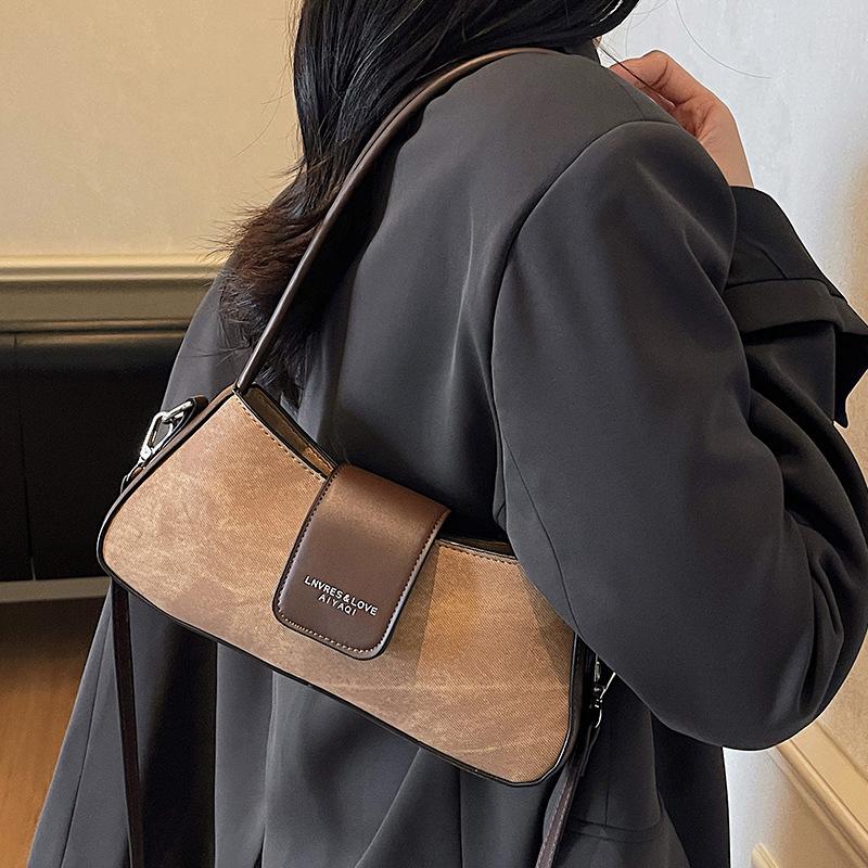 Textured small bag women's new women's versatile messenger bag French niche single shoulder underarm bag French stick bag