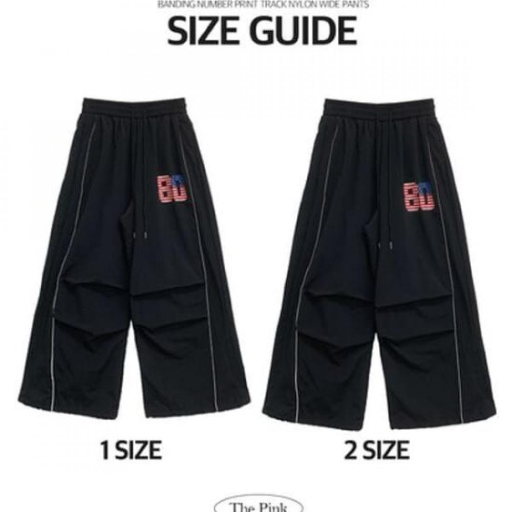 The Pink Men Ragel Banding Number Printing Track Nylon Wide Pants