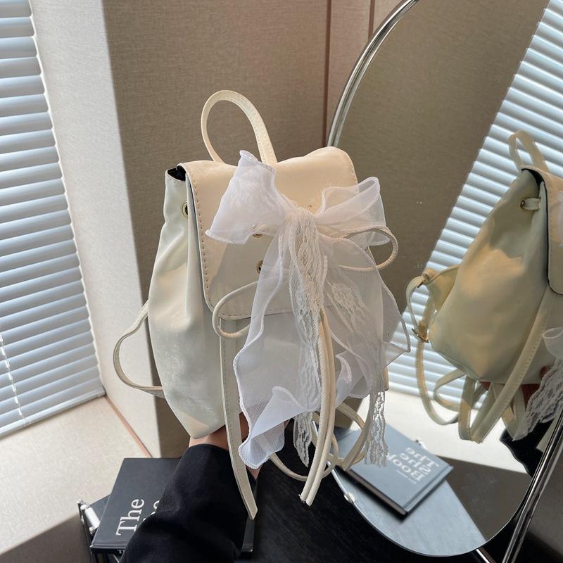 Ballet style bow backpack bag women 2025 new trendy Korean backpack cute portable shoulder bag schoolbag