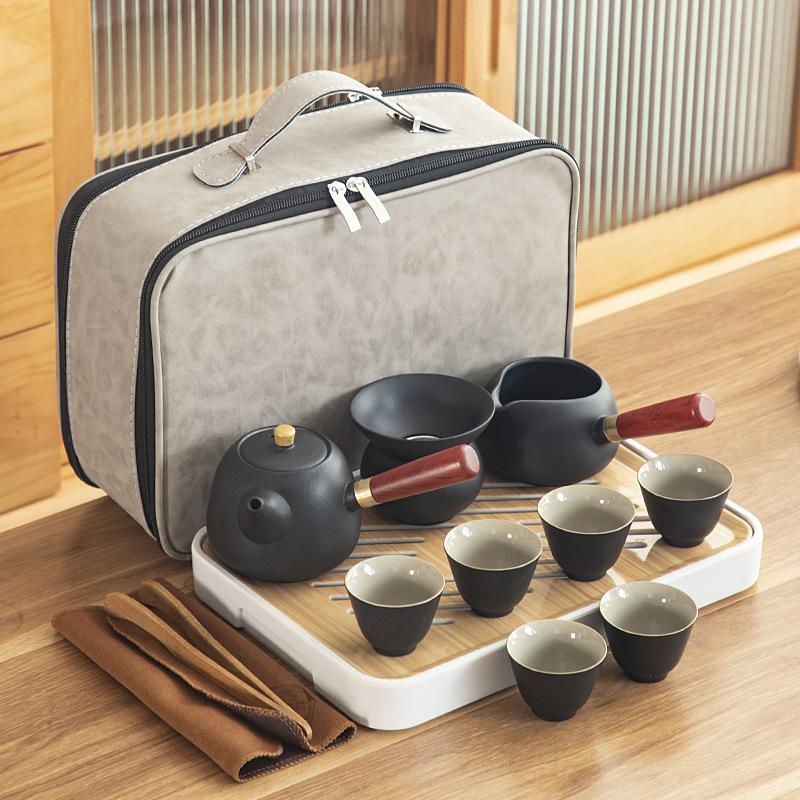 Black pottery Kung Fu tea set, cheap ceramic side handle pot with tea tray, portable complete set of business gifts