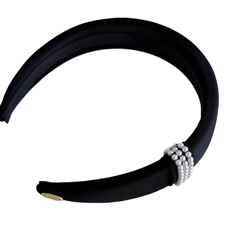 Zhao Ruth has the same black pearl headband for women's foreign light luxury headband hair jewelry.
