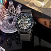 Eine minimalistische Herren-Freizeit-Uhr mit schwarzem Mesh-Armband und automatischem mechanischem Uhrwerk, mit einem hohlen Fünf-Sterne-Design