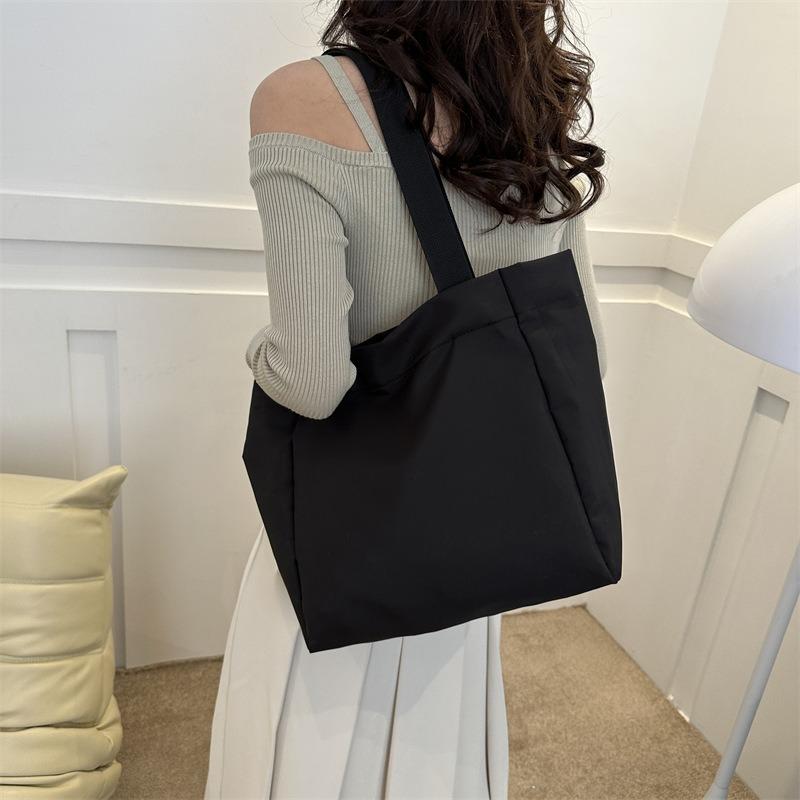 Bag women's new solid color large-capacity canvas shoulder bag simple commuter student tote bag shopping bag tide