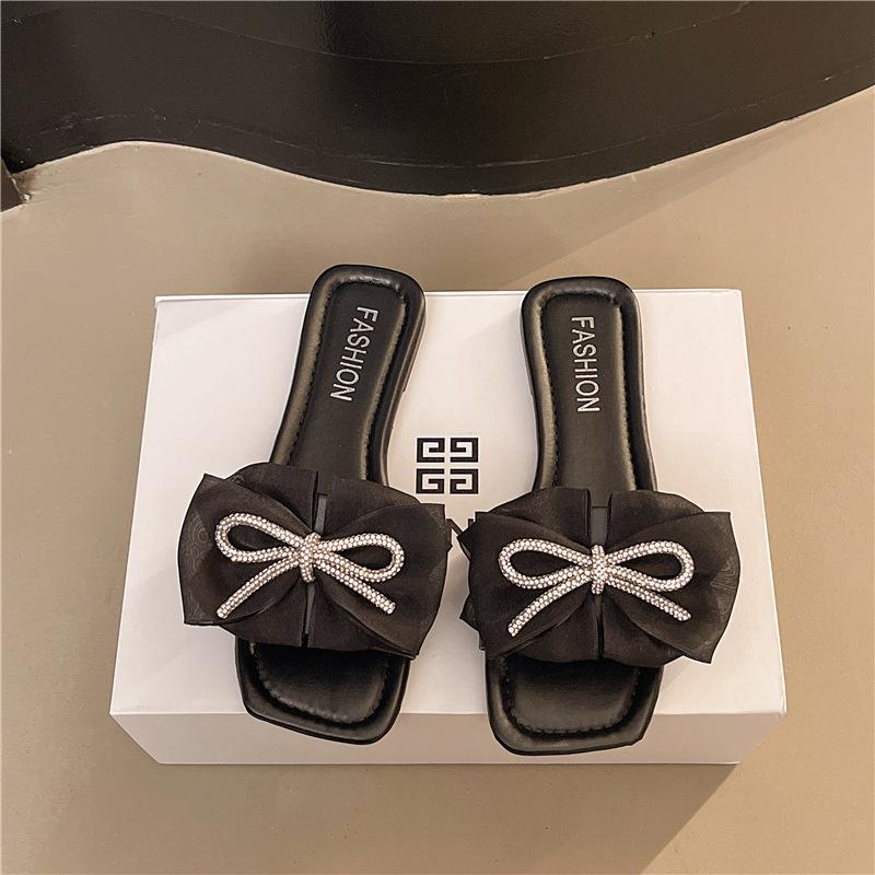 

2025 лето новые интернет-знаменитость бант плоская подошва одна полоса крутые шлепанцы женская обувь носить мода универсальные ins тренд 36 чёрный