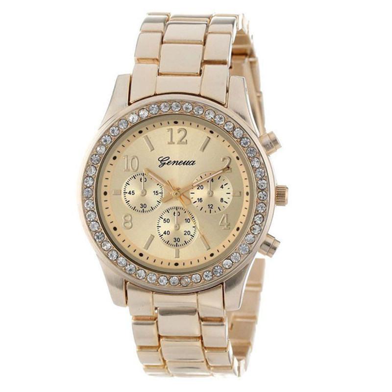 Geneva Rhinestone Ladies Watch with Steel Band and Decorative Three-Eye Design