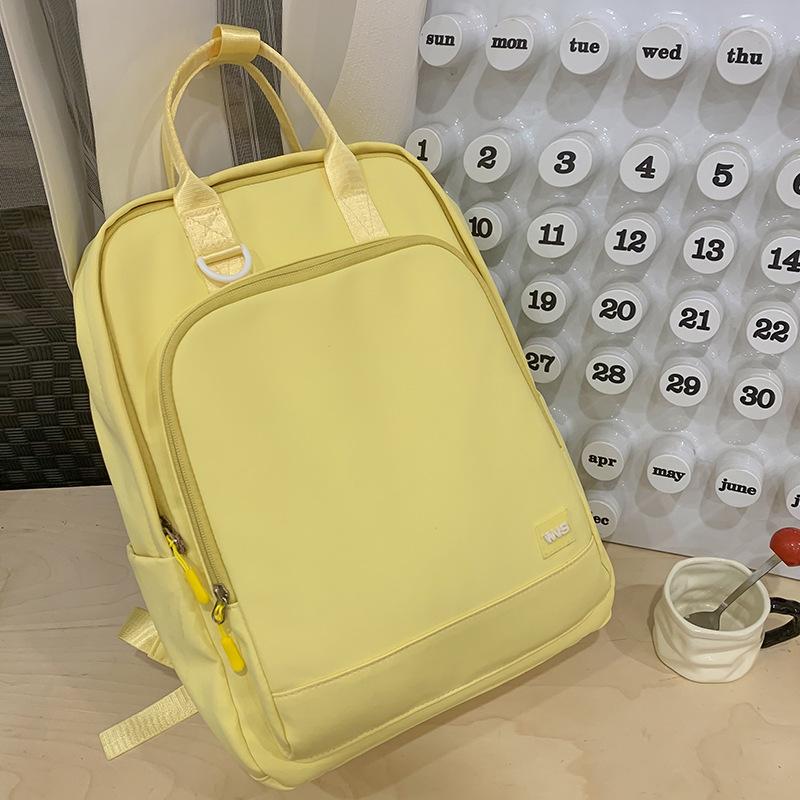 

Ручной детский школьный рюкзак Мальчик начальной школы Девочка средней школы Однотонный рюкзак жёлтый