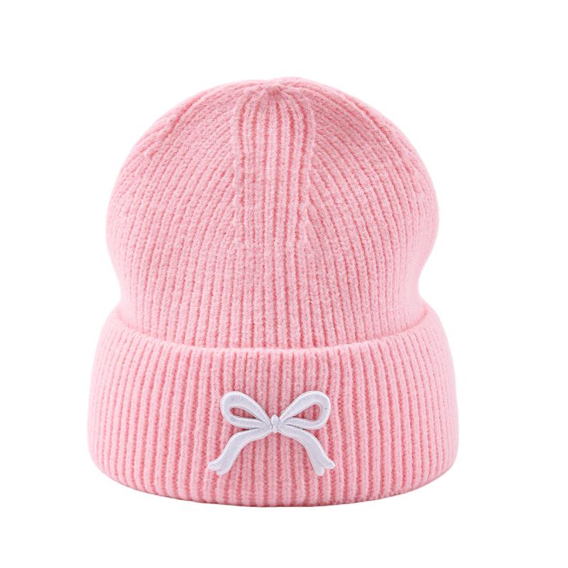 

Korean Cute Bow Knit Hat - Versatile, Warm, Solid Color for Spring & Autumn, with Ear Protection. One Size
