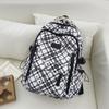 Schoolbag Korean plaid star backpack for female middle and high school students, large-capacity schoolbag, light and dirt-resistant versatile backpack