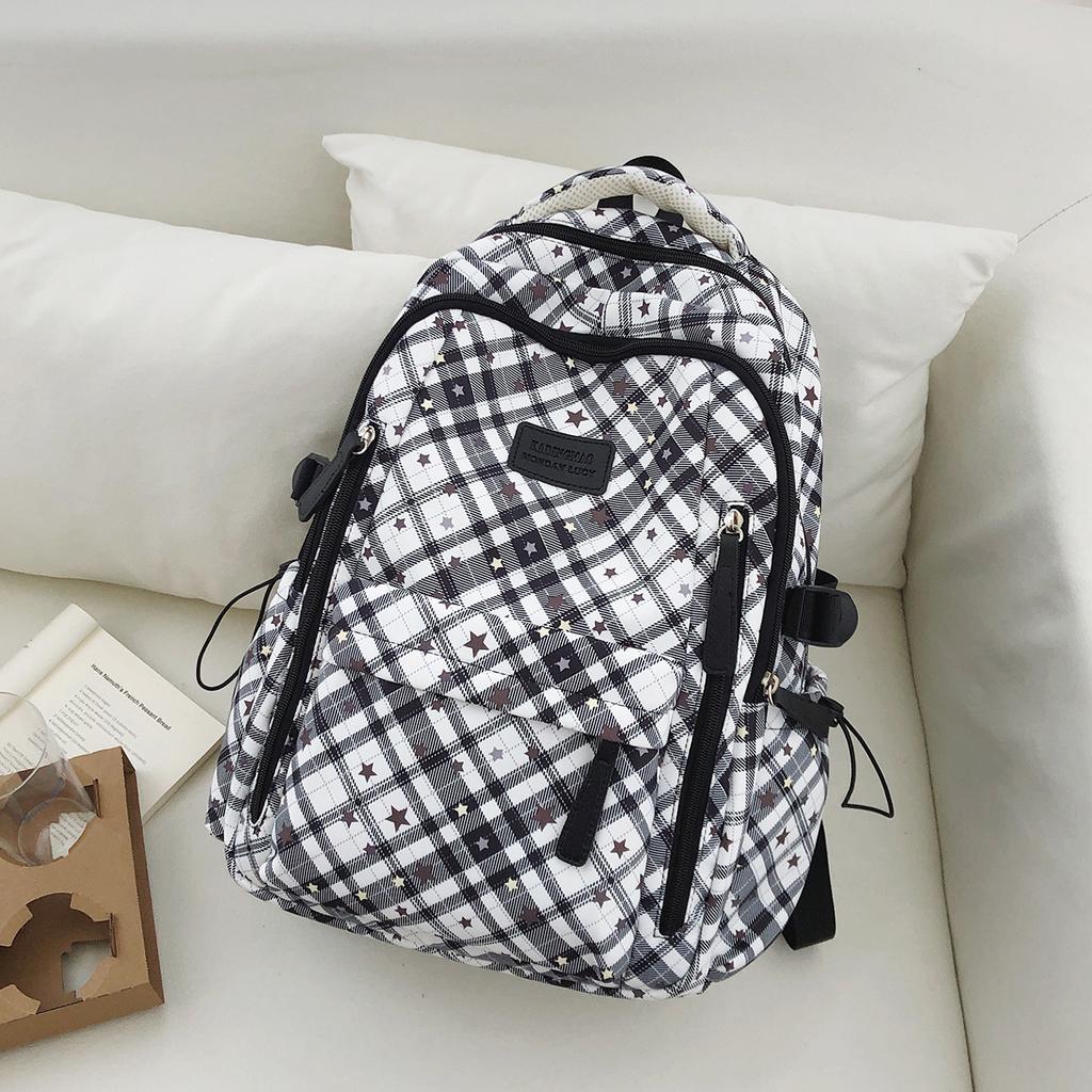 Schoolbag Korean plaid star backpack for female middle and high school students, large-capacity schoolbag, light and dirt-resistant versatile backpack