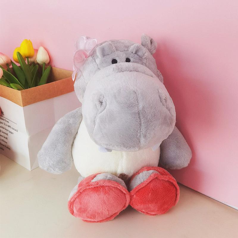 

Милая пухленькая плюшевая игрушка гиппопотам с цветком - Детская мультяшная кукла 25 cm светло-серый