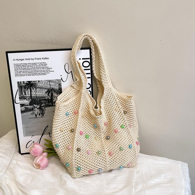 Large capacity tote bag women's seaside vacation weaving lazy literary leisure commuting leisure design shoulder armpit bag