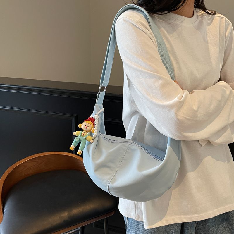 

Simple Dumpling Bag Japan fashion Crossbody Bag Women 2025 New Summer Cloth Bag Versatile Lightweight Commuter Shoulder Bag Small Bag Light blue single bag]