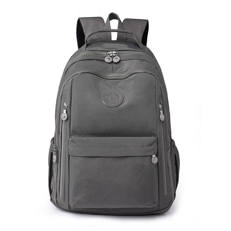 

Fashionable Multi Compartment Women s Backpack, Lightweight Student Backpack, Trendy Waterproof Nylon Cloth Bag, Casual Travel Bag сірий колір