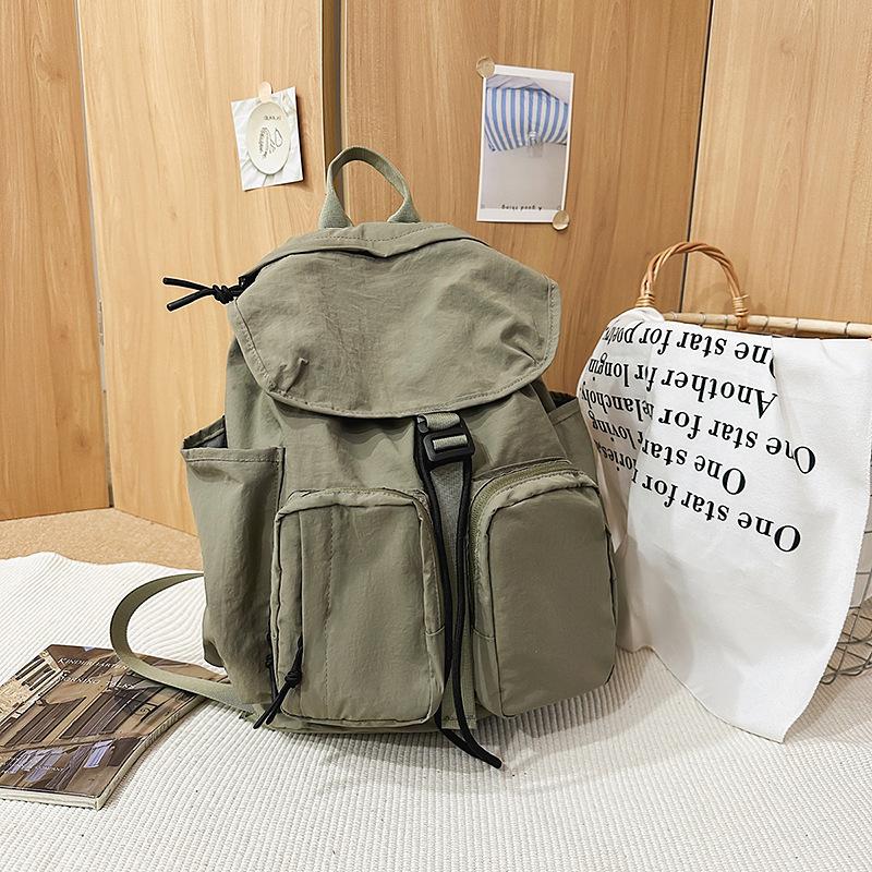 New high-value fresh and sweet backpack couple solid color simple mountaineering travel lightweight backpack