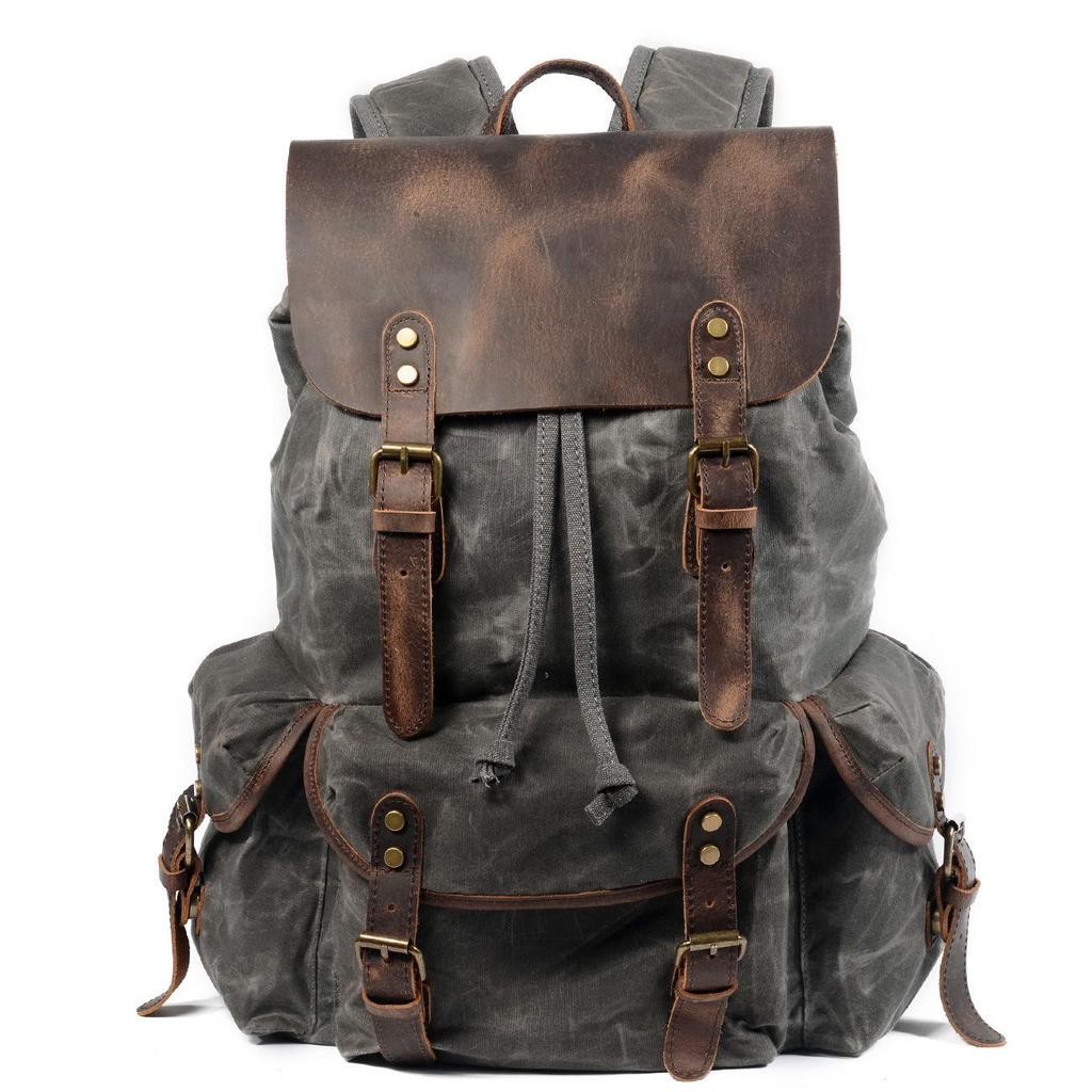 Retro Waxed Canvas Backpack - Men's Trendy Large-Capacity Shoulder Bag for Travel and Student Use.