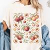 90er Pfirsich Vintage T-Shirt Botanischer Fruchtprint. Retro Cottagecore Garten Natur. Süßes Sommer Pfirsich Liebhaber Geschenk. Y2k Gewaschener Komfortfarben®