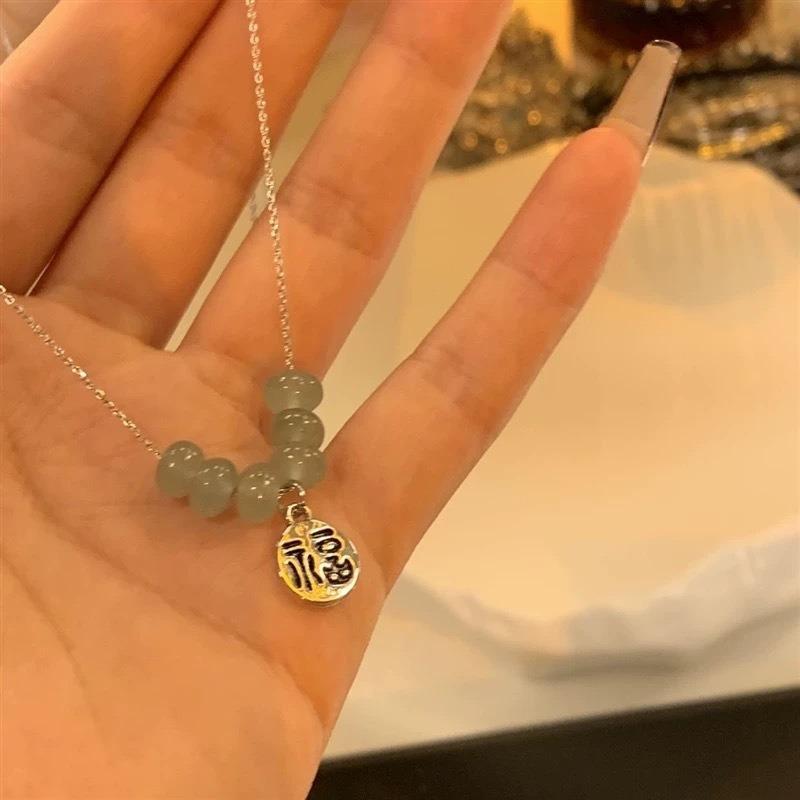 Wind, jade safety buckle necklace 2026 new women's niche design clavicle chain neck chain