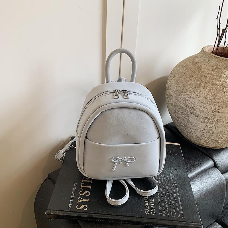 

2025 новый нишевый универсальный модный мини-рюкзак, повседневный рюкзак-бант для поездок на работу, маленький школьный рюкзак 19*8.5*21 синий