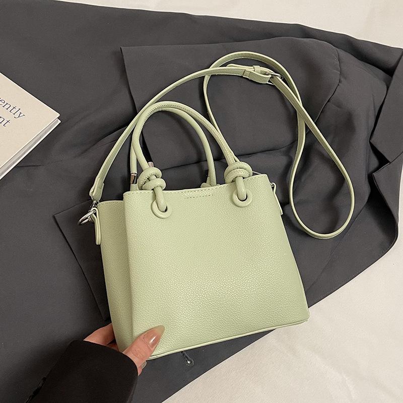 2025 New Simple Solid Color High-end Portable Bucket Bag Spring and Summer New Versatile Casual Commuter Messenger Bag